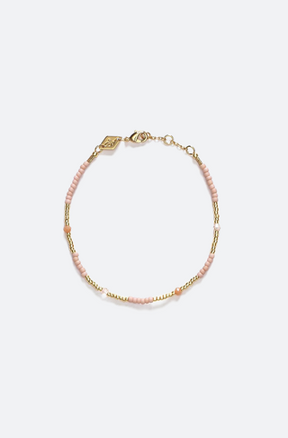 goldenes Armband mit rosa Perlen